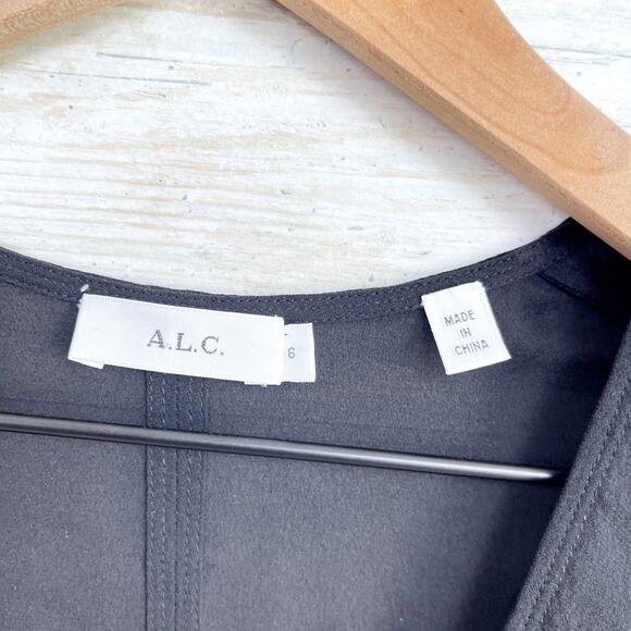 A.L.C. 100% Silk Crepe Tulip Hem Peplum Blouse Black Semi Sheer V Neck Womens 6 - Picture 8 of 9